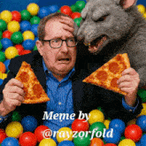 a man is holding a slice of pizza next to a rat