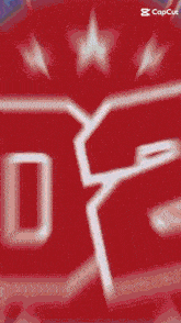 a red background with the number 02 and the word crom in blue