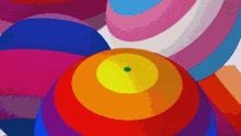 a group of colorful balls with a green center