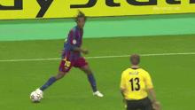 a soccer player with the number 10 on his jersey kicks the ball