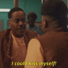 a man talking to another man with the words i could kiss myself