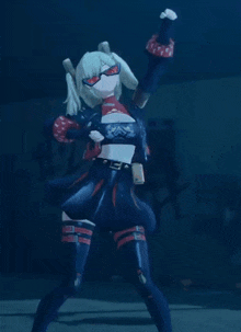 a girl in a black and red outfit is dancing in front of a wall with the number 12 on it