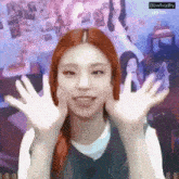 a girl with red hair is making a funny face