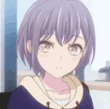 a close up of a girl with short purple hair and pink eyes wearing a hoodie .