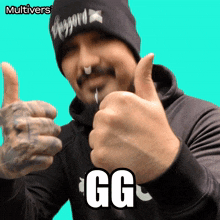 a man giving a thumbs up with the word gg on his sweatshirt