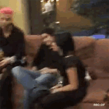 a group of people are sitting on a couch and the gif says rbd.gif at the top