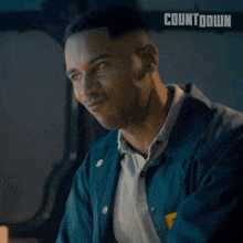 a man in a blue jacket says yes come on in a countdown ad