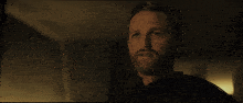 a blurry picture of a man and woman in a dark room