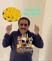 a man is holding a plate of bananas and giving a thumbs up while wearing a happy birthday shirt .