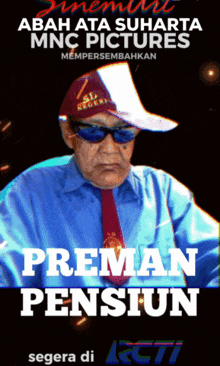 a man wearing sunglasses and a hat with the words preman pensiun written on it