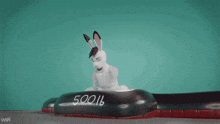 a drawing of a rabbit with the word wsh on the bottom right