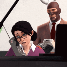 a man in a suit and tie stands behind a woman talking on a phone