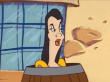 a cartoon character is sitting in a barrel