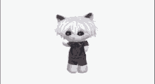 a stuffed cat with red eyes is standing on a white background .