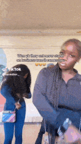 two women are standing next to each other in a room with a caption that says wen yk they cnt never stand