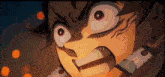 a close up of a demon slayer character 's face with a very angry look on his face .