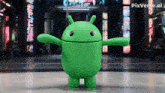 a green robot is standing in front of a building with pixverse.ai written on the bottom