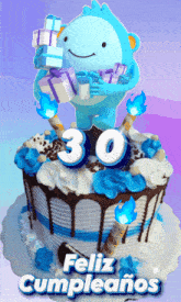 a blue and white cake with the number 30 on top