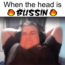 a man with his hands behind his head with the words when the head is bussin above him