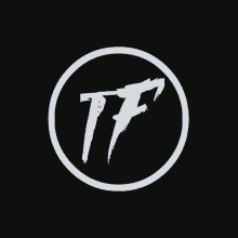 a tf logo in a circle with lightning coming out of it