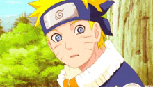 a close up of a cartoon character wearing a headband with a letter g on it .