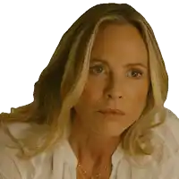 a close up of a woman 's face with a serious look on her face