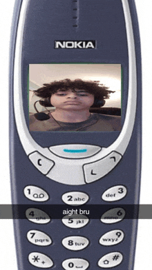 a nokia cell phone with a picture of a man on it