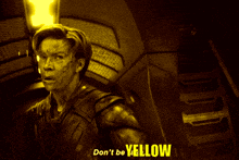 a man says " don 't be yellow " while holding his hand out