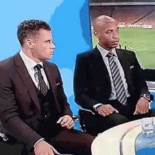 Jamie Carragher Thierry Henry GIF - Jamie Carragher Thierry Henry Leg Touch  - Discover & Share GIFs