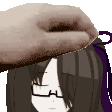 a hand is petting a girl 's head with a purple bow .