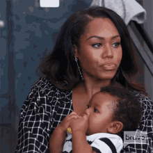 carrying a baby monique samuels real housewives of potomac rhop babysitting