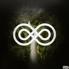 a picture of a road going through a forest with an infinity symbol