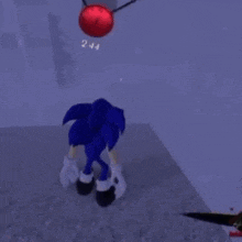 sonic the hedgehog is jumping in the air in a video game while a red ball is flying in the background .