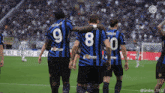 a group of soccer players wearing jerseys with the numbers 9 8 and 0