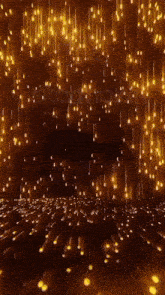 a purple light is coming out of the ceiling in a dark room with a lot of lights .