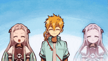 a boy and two girls are standing next to each other smiling