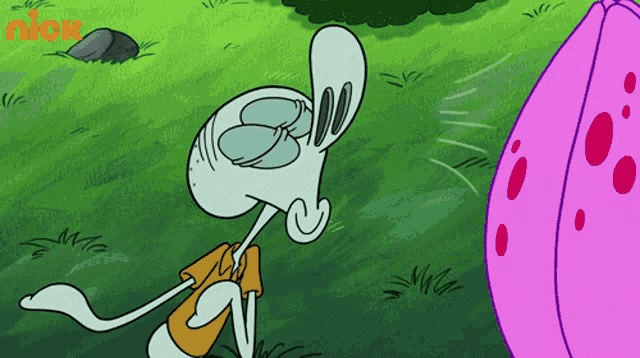 squidward from spongebob squarepants is standing next to a pink bubble