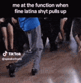 a tiktok of a man dancing with the caption " me at the function when fine latina shyt pulls up "