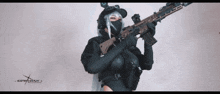 a woman holding a gun with the word cosplay written on the bottom