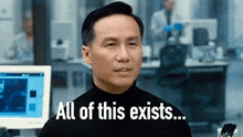 a man in a black turtleneck is saying `` all of this exists ... ''