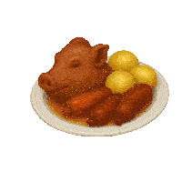 a plate of food with a pig 's head on it