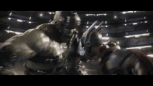 hulk and thor are fighting each other in a boxing match .