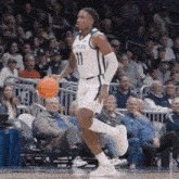 a basketball player with the number 11 on his shirt