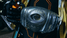a close up of a robot 's eye with the letter u visible
