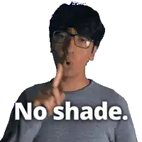 a man wearing glasses holds his finger to his mouth and says " no shade "