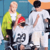 a person in a wheelchair with the number 23 on their jersey