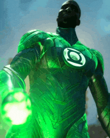 a man in a green lantern costume with a green light on his chest