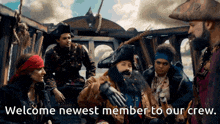 a group of pirates on a ship with the words welcome newest member to our crew written below them