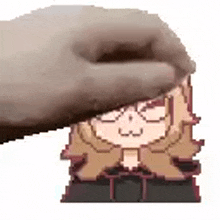 a hand is holding a pixel art of a girl 's head .