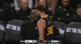 a basketball player wearing a jersey with the number 30